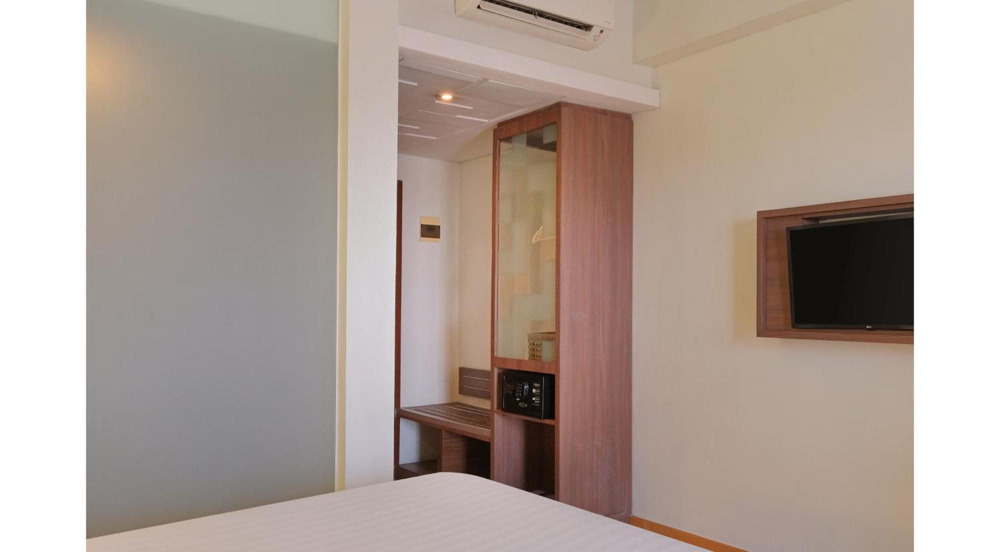 Quest Hotel Simpang Lima - Semarang By Aston Room photo